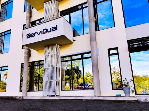 A view of the front of a ServiQual office.